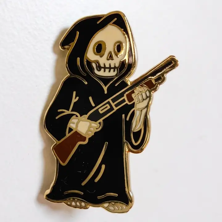 Armed Reaper enamel pin