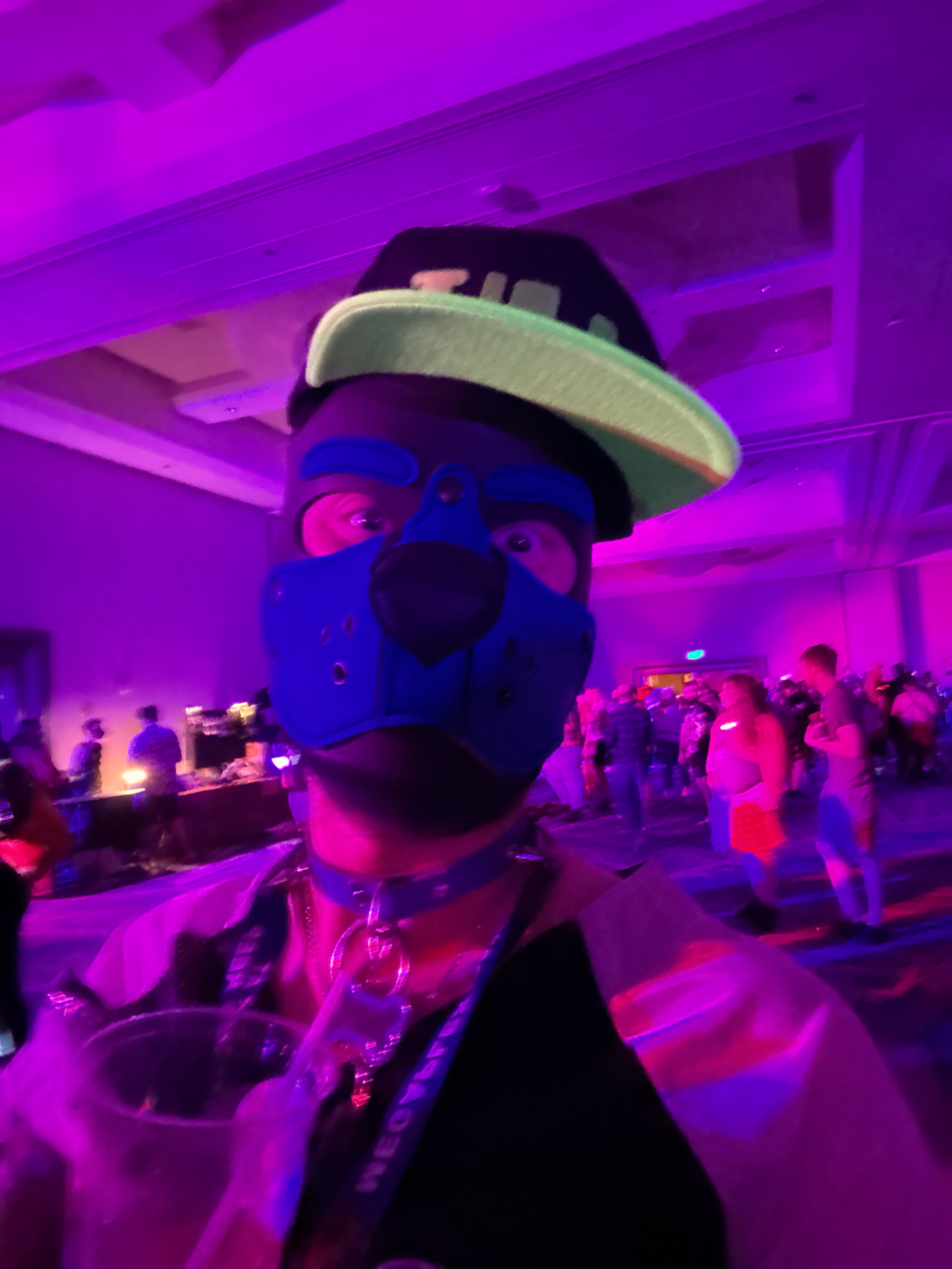 Frostbyte at a convention under purple lights